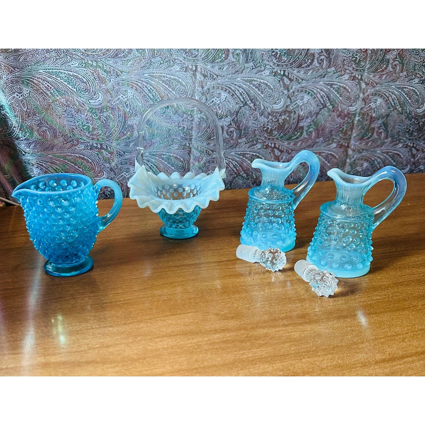 Set of vintage Fenton blue topaz hobnail glass creamer two curettes with stoppers and ruffled rim basket