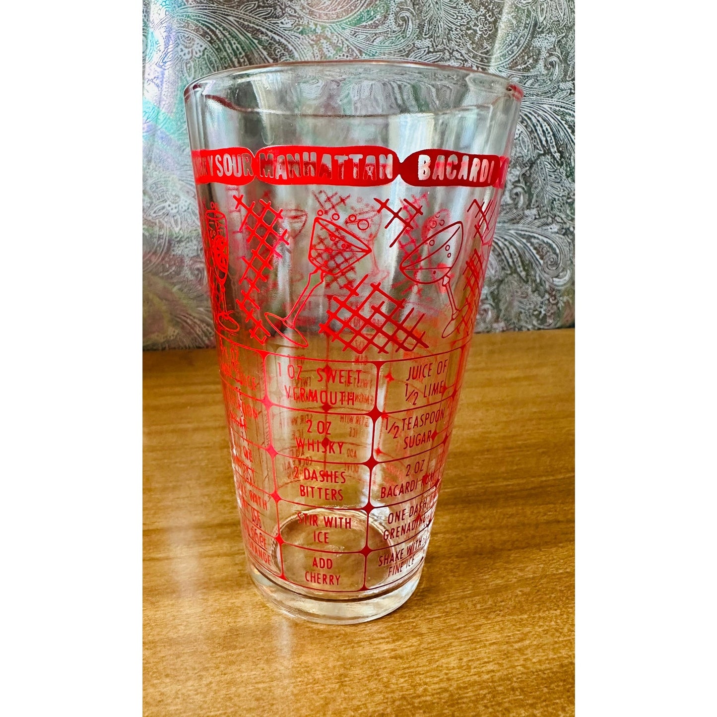 Vintage Federal glass red bartender measuring/mixing glass with 7 drink recipes.